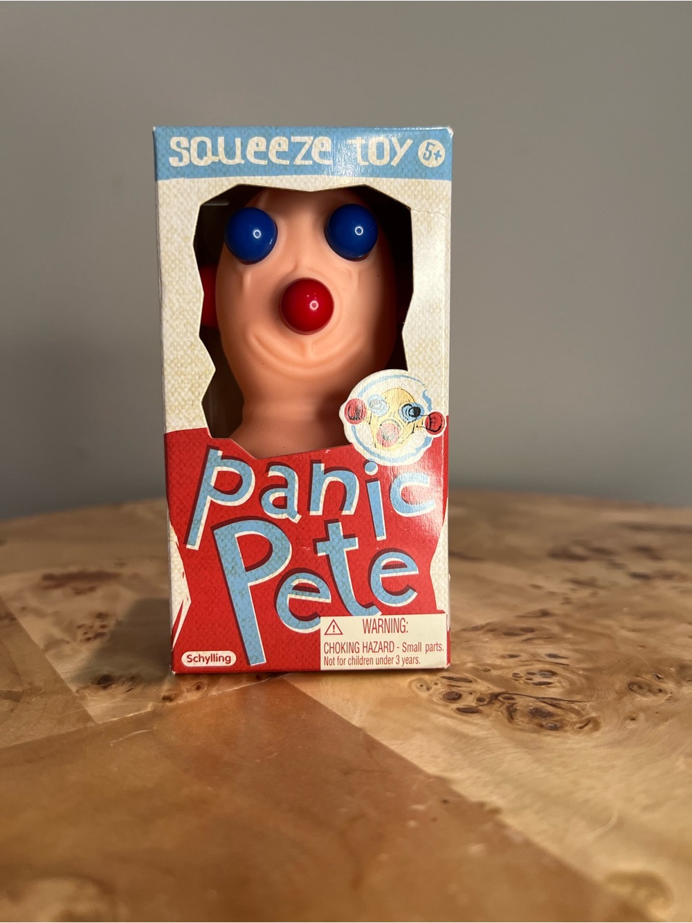 Schylling Panic Pete Squeeze Toy - Peach with Blue & Red Accents